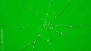 Shattering Glass on Green Screen - A crack spreads across a screen, simulating breaking glass against a vibrant green screen background.