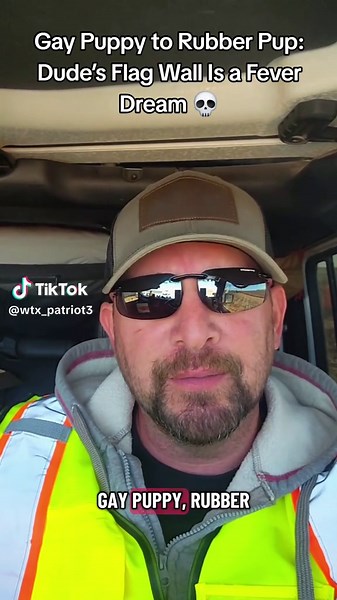 Gay Puppy to Rubber Pup: Dude’s Flag Wall Is a Fever Dream 💀 #WokeWeirdo #PrideParadeFail #FYP #MAGA #FreakFlags