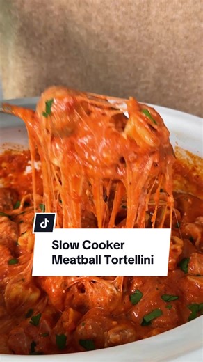 Keep dinner simple this week with slow cooker tortellini meatballs! 🙌 This dish is easy and loaded with flavor. Get the ingredients below and tap the link in @allrecipes bio for the full recipe. Ingredients: 1 (28 ounce) bag frozen meatballs 2 (40 ounce) jars marinara sauce 2 teaspoons Italian seasoning 1 teaspoon salt 1 teaspoon cracked black pepper 1 (8 ounce) block cream cheese, cubed 1 bag frozen tortellini 1 cup shredded creamy mozzarella cheese fresh parsley or basil for garnish Inspired 