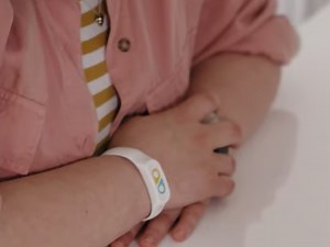 Your boss just gave you a pretty wristband. It reveals what mood you're in