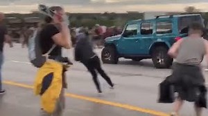 Watch: Car drives through crowd of protesters in Aurora, Colorado