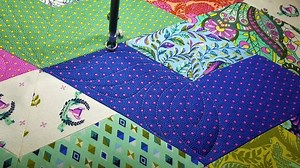 I've been working on a new YouTube video featuring Jaybird Quilts Boomerang quilt made from Tula Pink fabric.....stay tuned.... | Machine Quilting by Angela