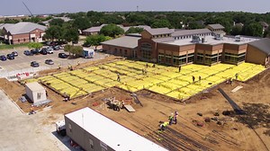 Construction is moving right along on the Flower Mound Public Library's expansion and renovation! 📚🚜 This week, crews are completing the northern building foundation, with structural steel installation to follow. Crews will then switch to the south side of the Library to begin foundation work. Also, all parking on the north side of the Library is complete, including the Peters Colony Memorial Park parking lot. The project continues to remain on schedule, with an anticipated completion date of 