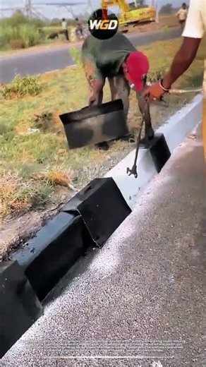 Precision stencil masking technique: Rapid curb painting for clean highway border marking