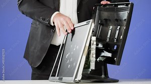 Computer failure, error, stress at work concept. Mad aggressive impulsive crazy adult guy breaks down laptop device screen with hammer. Funny angry nervous office worker smashing monitor and keyboard Stock Video