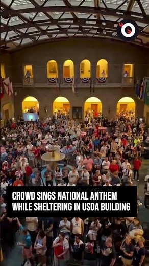 Crowd sings national anthem while sheltering in USDA building