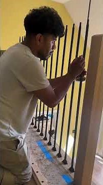 Accurate Layout: Using a laser level and blue tape for perfect alignment.