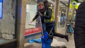 Sacked McDonald's worker soaks homeless man with mop & kicks sleeping bag