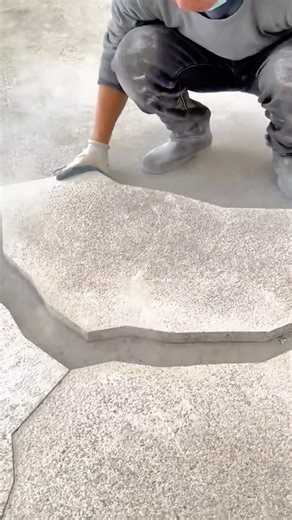 Precision Placement of Interlocking Stone Pavers by a Skilled Construction Worker