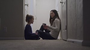 Mom Sits On Floor With Daughter Playing Game