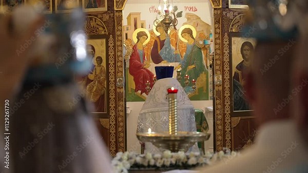 Pope, Priest is Praying, Processing the Wedding Ceremony. Crowns on heads of brides. Bride and Groom in the Church.