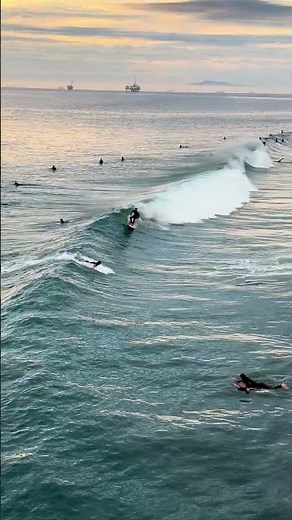 Sunset Surfer at the Huntington Beach Pier 🌅 🌊🏄‍♂