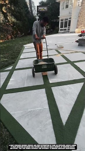 Spreading lawn sand evenly using drop spreader