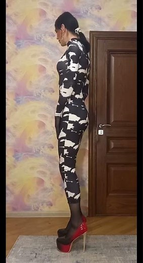 Crossdresser in a long dress posing