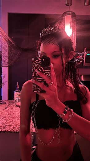 MBM on Instagram: "Complete look on my page. diy siren costume . Time: 2 hours Cost of needed materials: $9 . How the costume was constructed/styled from top to bottom. -Painted a lil kids mermaid crown using black, silver and navy acrylic paint. -Ears are from Amazon, used hot glue to make extensions, 18g wire to stabilize, nail polish to paint the hot glue - ruffle bralette under a lace Victoria’s Secret bra, random chain laced through - bedazzle fishnets, skims lace boy shorts, spiderweb tabl