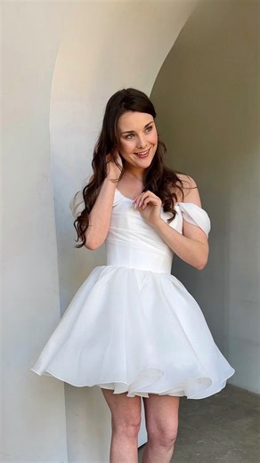 23K views · 365 reactions | Guests in white dresses at your wedding. Yes or No?樂 Dress: Fiorelia Dress: Mitsis + detachable skirt Airis #weddingdresses #weddingusa #miniweddingdress #alineweddingdress #convertibleweddinggown #cobvertibleweddingdress #bridetobe2024 #oliviabottega | Olivia Bottega Dresses | Facebook