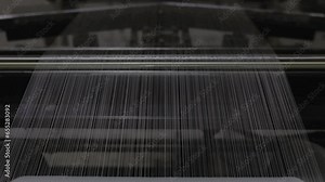 Textile factory , A view of the movement of yarn cans, Machines collecting thread, Thread. Automatic textile machine,Thread,fabric