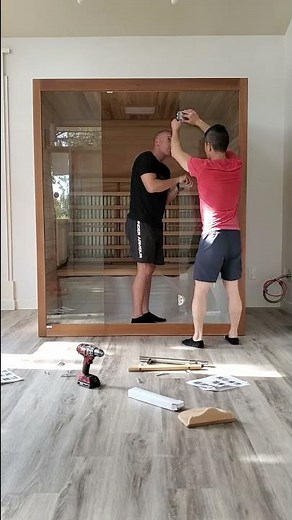 Putting together a sauna in my friends living room.. 😎