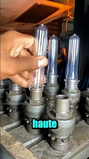 The manufacturing of water bottles in a factory
