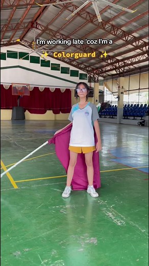 Stunning Colorguard Performance: Back Hand Catch and Vibrant Flags