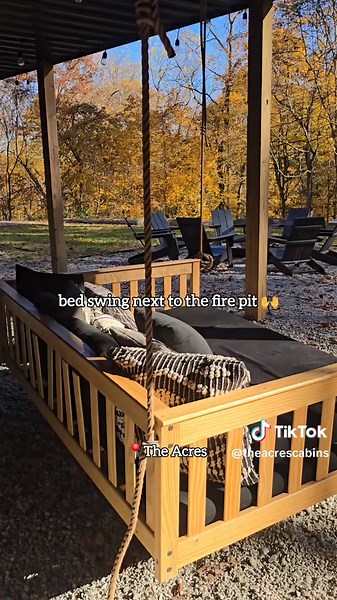 We love these cozy outdoor spaces at the cabin ✨ - covered outdoor fireplace with comfortable furniture - grill - table & chairs - infinity hot tub - outdoor shower - bed swing underneath by the fire pit Where will you relax first? #theacrescabin #hockinghills #cabingetaway #cabininthewoods #hockinghillsstatepark #hockinghillsohio