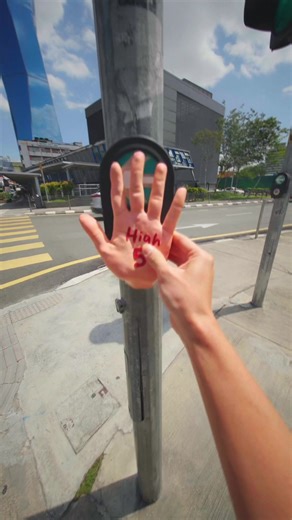 Making the wait at red light 10% less boring. ✋🤪 P.S.- 3D-printed temporary installation, held up with double-sided tape, no marks, no damage, no trace. #streetart #surreal #whimsical #malaysianartist #artinstallation