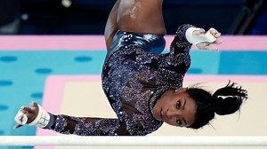 Simone Biles powers through calf injury, dominates at Paris Olympics qualifiers