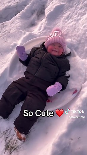 Cute Kids Enjoying Snow Sledding Fun