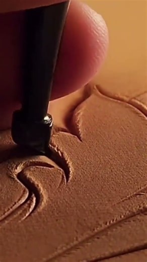 The process of engraving on a special material neatly using special tools