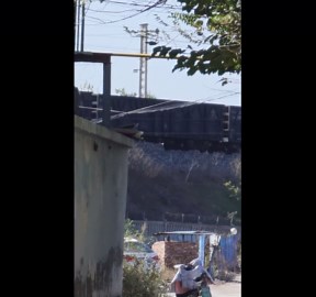 Electric train appears suspended on elevated track in Hebei, China