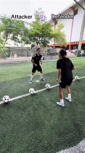 Ultimate football duel between attacker and defender
