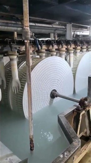 Horizontal brushing to clean the palm and fingers of the gloves, followed #GloveFormer #production