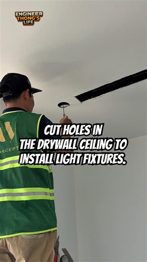 Cut holes in the drywall ceiling to install light fixtures #engineerthong #shorts