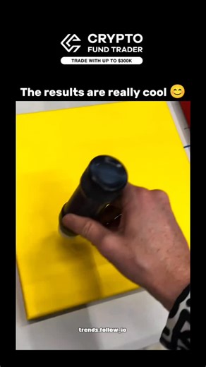 AI Clips • Funny Clips on Instagram: "This X post showcases a 14-second video of an artist using a squeeze bottle to paint a playful cartoon face on a yellow canvas, incorporating black outlines and glitter for a textured, whimsical effect that evolves from a single eye to a full smiling character. Posted by Indonesian creator @axilaya on 23 December 2025, the silent clip has rapidly accumulated 578,000 views and 353 likes, drawing praise in replies for its innovative simplicity and cuteness, re