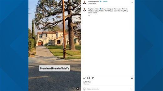 Smoke can be seen near the '90210' house in Altadena as fires rage on in southern California