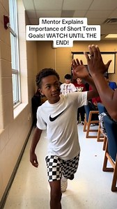 Mentor uses inspiring demonstration to teach kids about goals