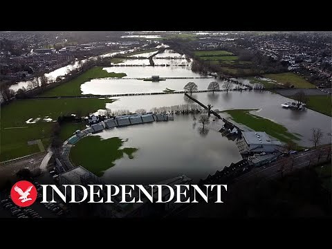 UK floods: West Midlands river overflows after torrential rain