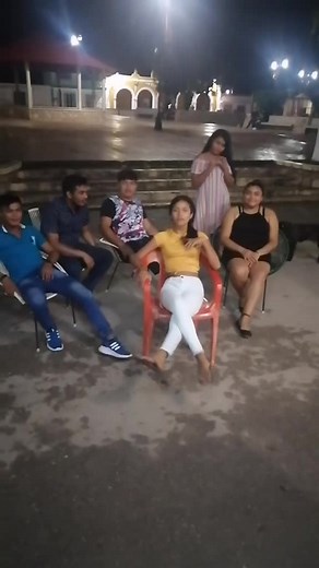 Outdoor Nighttime Gathering with Friends