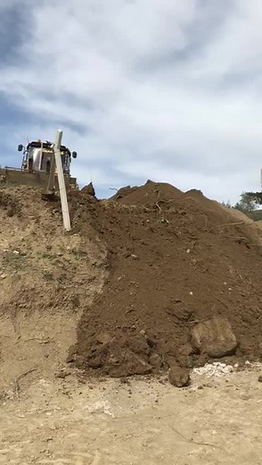 Backhoe Loader in Action at Construction Site