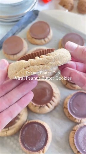 Reese’s Cup Peanut Butter Cookies 🤩Literally OBSESSED! Only 4 ingredients and PERFECT for the BIG GAME 🏈These are PERFECTION!!! 😍🍪One of my most popular cookie VIRAL recipes!I dare you to find a better peanut butter cookie (except maybe my peanut butter M&M STUFFED cookie 🤩)My friends ask me for this recipe all the time because they are literally perfection!!!I have made 1000s of cookies and I always go back to this recipe! 😍I have a couple friends who literally brighten up with a batch of