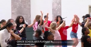 Grade school kids participate in flash mob