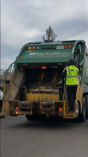 Waste Management Garbage Truck Packing Trash