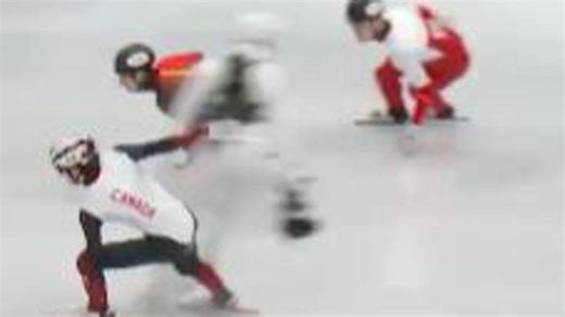 Cameraman sent flying at Winter Olympics as speed skating descends into chaos