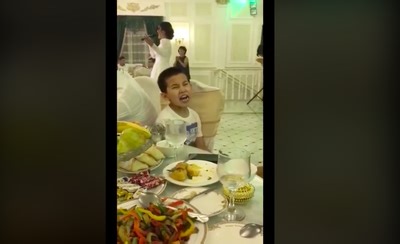 Kid mimics opera singer at wedding and it's the funniest thing ever!