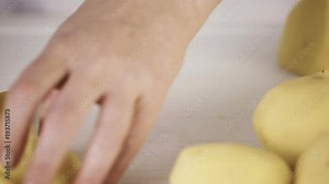Step by step. Slicing Yukon gold potatoes for classic mashed potatoes