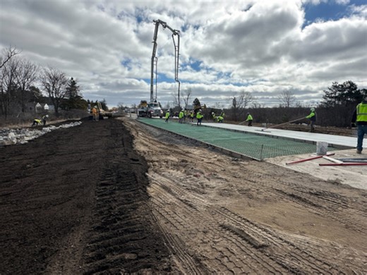 Concrete poured on M-20 following March 12 culvert failure
