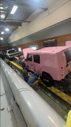Mercedes G wagon quarter panel wrapped in pink colored PPF, all one piece! Film from fresh films co.