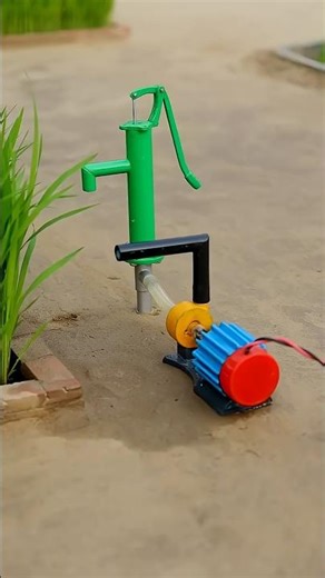 Watering the rice plants by attaching a pump to the hand pump. #generationearth