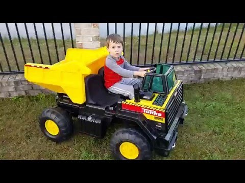 Kids ride on Tonka Dump Truck in action - 12v Power Wheels