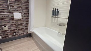 6.5K views · 69 reactions | I’ve never had an ADA hotel room where I needed to set up my own shower bench. I called the front desk and someone will come help (it’s quite heavy), but I think I’m more surprised this is the first time I’ve seen this. I both love the logic (especially because it can be moved to another room if needed) and dislike the lack of immediate access. Anyone else have a room set up like this? | The ADA Nerd | Facebook